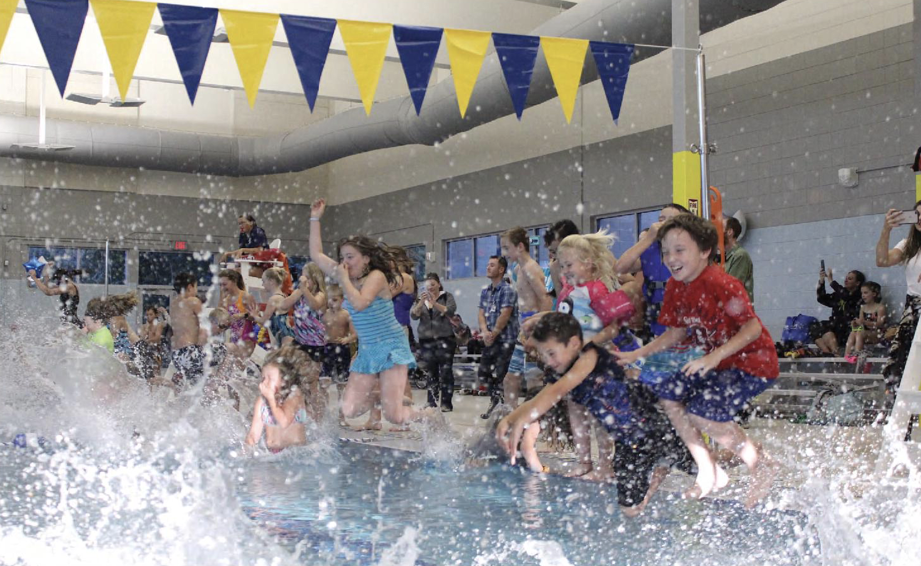 Kids jump in renovated pool